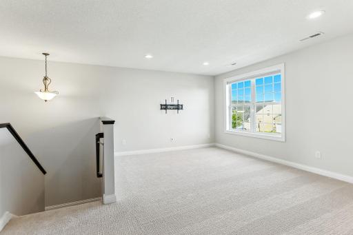 Wonderful family/loft as you walk into the upper level.