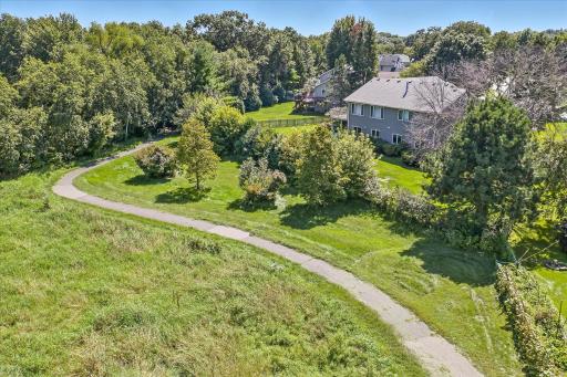 Here is the rear - here you can see that the trail is a good distance from the back yard, and much more the house.