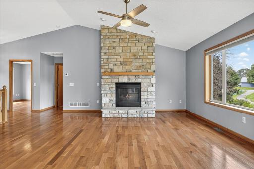 The entrance to both main level bedrooms is to the left. The amazing back yard views are through the huge windows on the right.