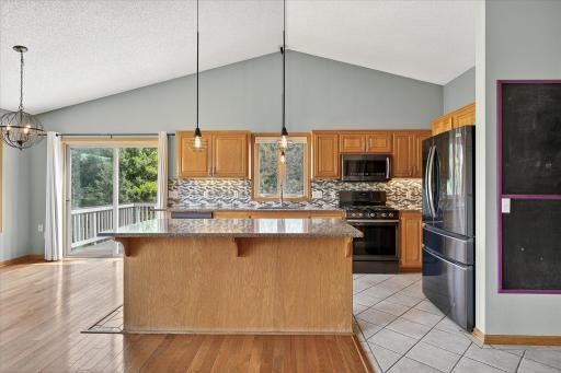 The kitchen is open, vaulted, modern & bright.
