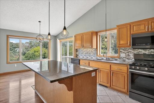There is so much nautral sunlight in this space! But every one of these windows has coverings, so you can darken the space for maximum privacy too.