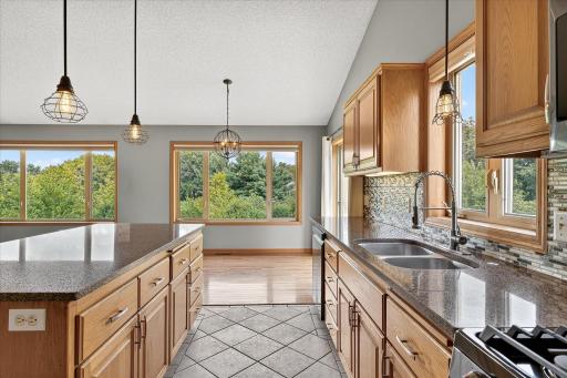 The sink is stainless steel and features a recently replaced disposal, as well as a single-lever, brushed nickel faucet with a pull out sprayer. The dishwasher is stainless steel lined inside, with a 3rd-level silverware drawer.