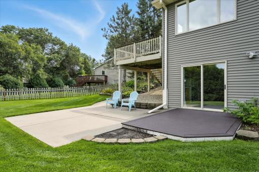 The 12 x 8 lower level deck is made out of low-maintenance Trex.