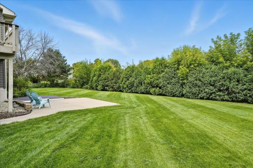 The privacy of the fully fenced back yard is awesome. And right over the fence is a trail system that traverses all around the neighborhood.