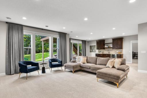 Walkout access from the lower level extends living space into the backyard