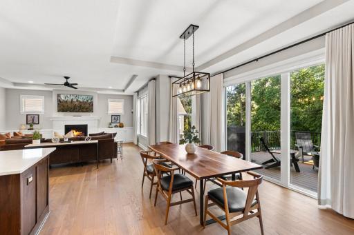 Sunlight pours through the main level, enhancing its open and inviting feel