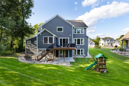 Spacious patio offering additional room for outdoor gatherings and relaxation