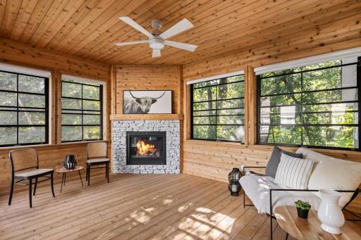 Four-season porch is a bright and versatile retreat with its own fireplace