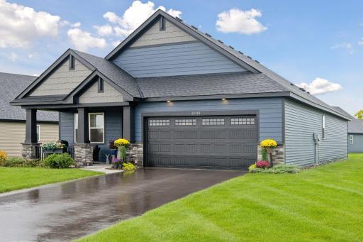 Welcome to this beautifully crafted 2024 home in the Fields of Winslow Cove, where style and comfort meet.