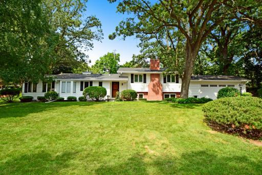 Welcome to 2305 Brookridge! Set amid towering trees and just a stone's throw from Bassett Creek this delightful neighborhood is a nature lovers dream.