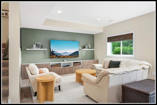 Bright and airy family room on the lower level that doesn't feel like a "lower level" with lookout windows