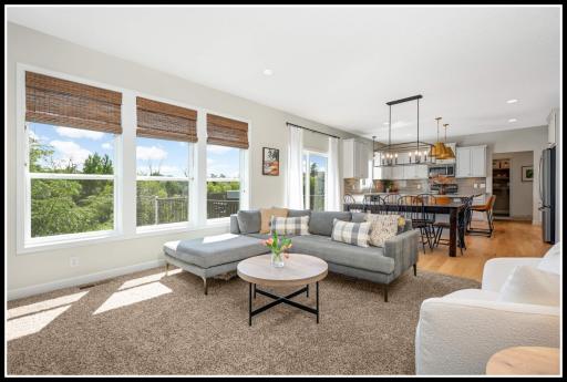 South-facing picture windows bring in sunlight all day long and views of the wetland preserve