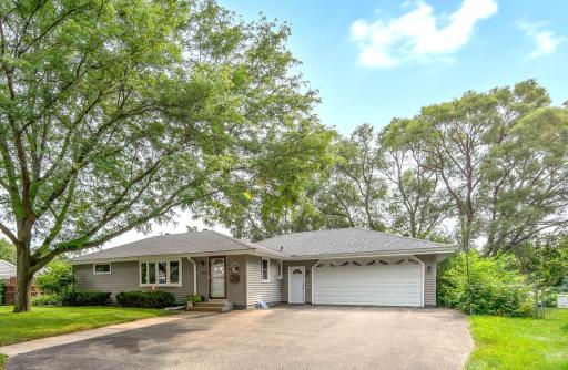 Curb appeal draws your eyes to this beautiful home with an oversized 2 car garage with separate service door entrance.
