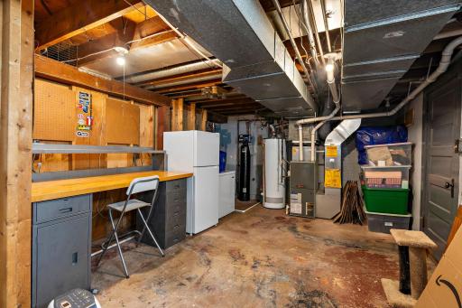Modern mechanicals and the fridge, freezer, and workspace will stay!