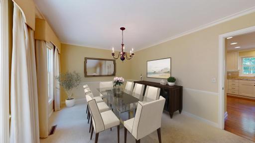 Generously sized formal dining room, perfect for hosting gatherings of family and friends. virtually staged