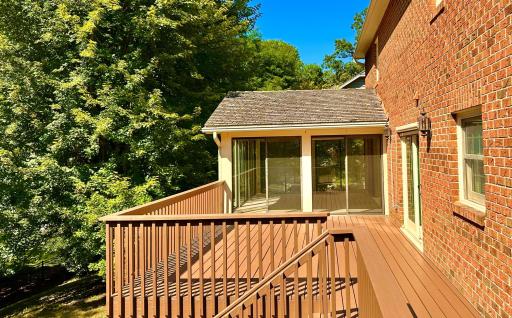 Outdoor deck offers connection to the backyard and gardens.