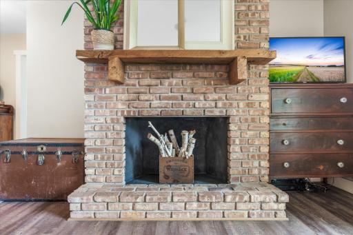 Close up of fireplace and wooden mantle
