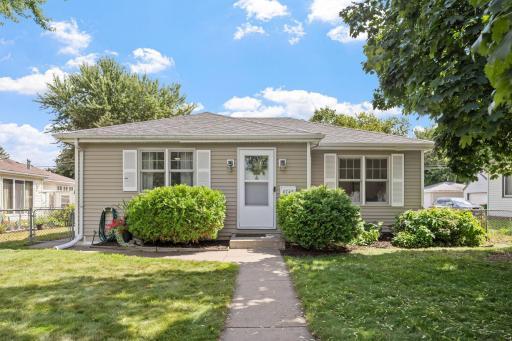 Charm meets modern convenience in this 2 bed, 2 bath home in Crystal!