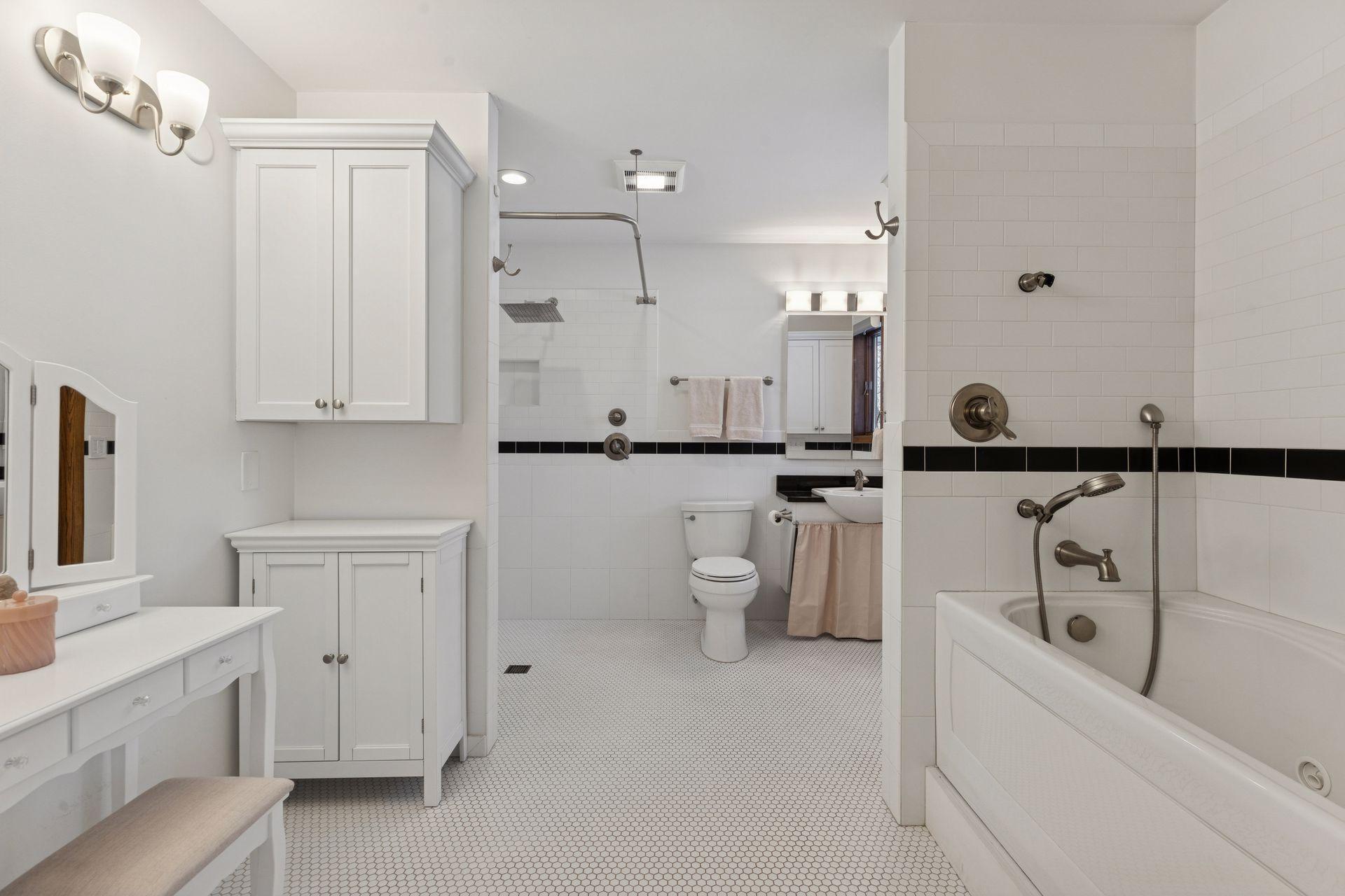 Very spacious full bath with separate roll-in shower and tub - all fixtures are lowered.