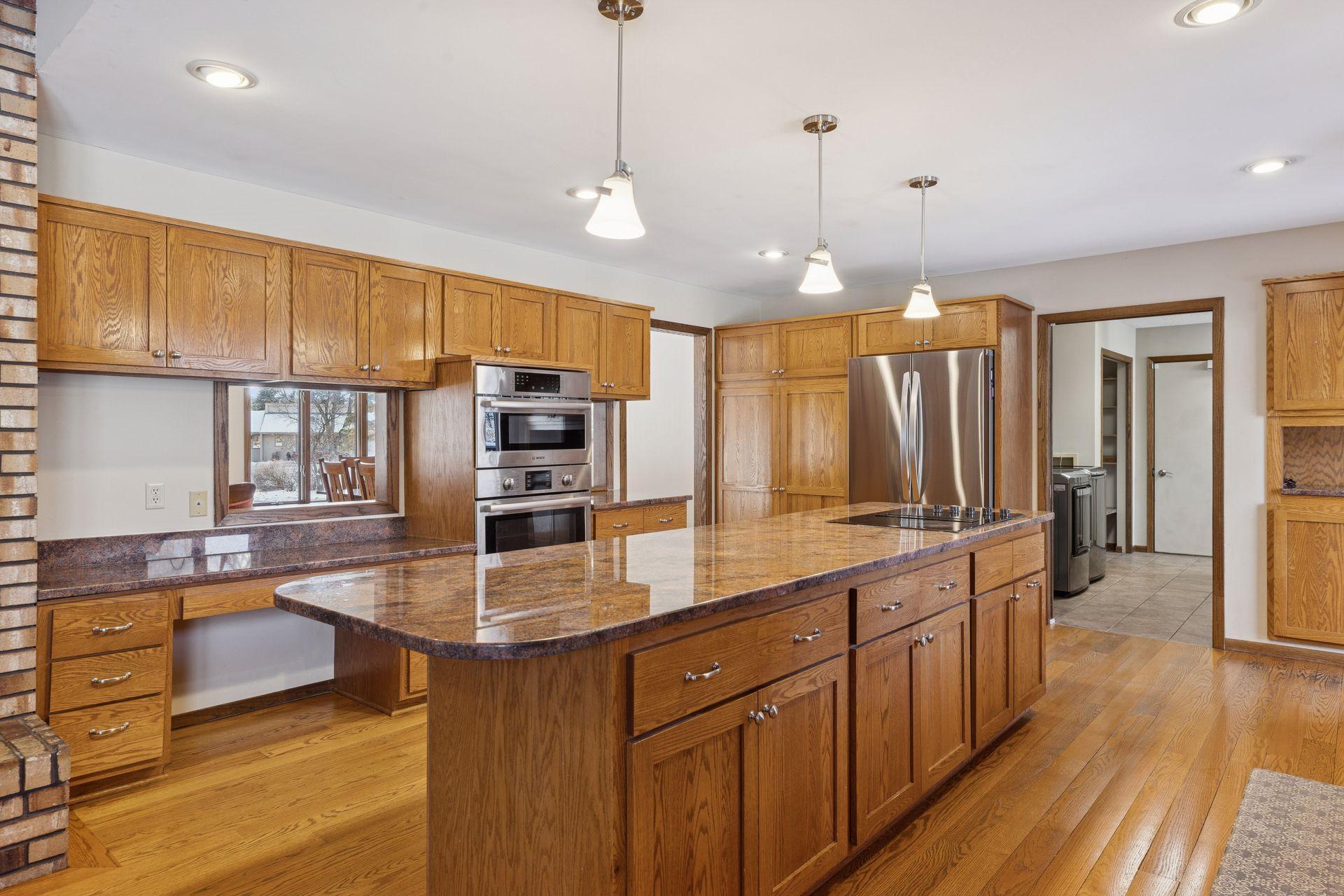 Kitchen also includes a built-in desk.