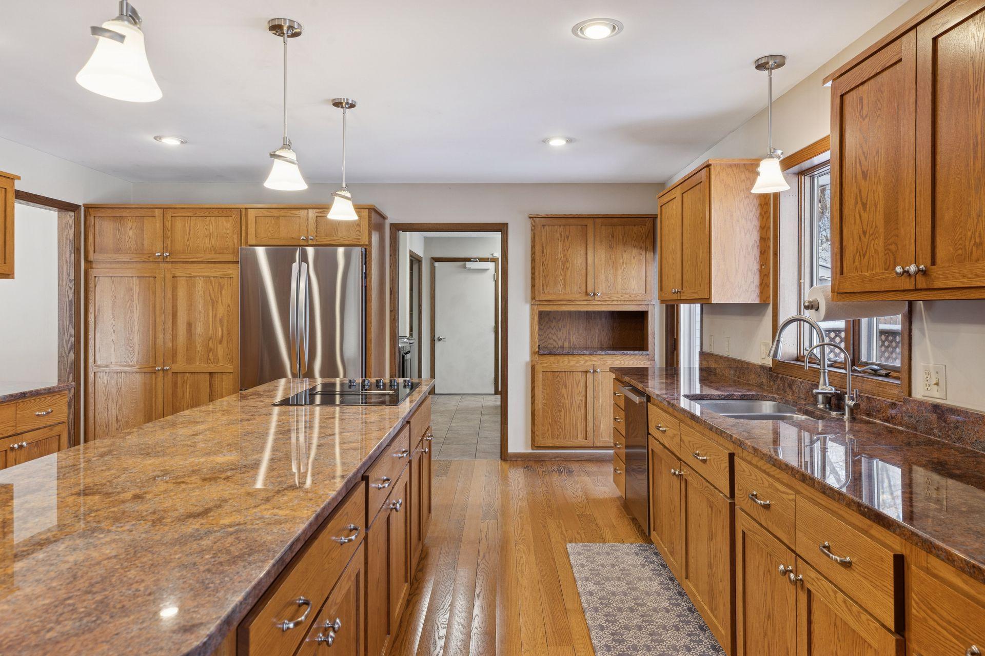 Adjacent is the main floor laundry/mudroom with garage and wheelchair lift access.