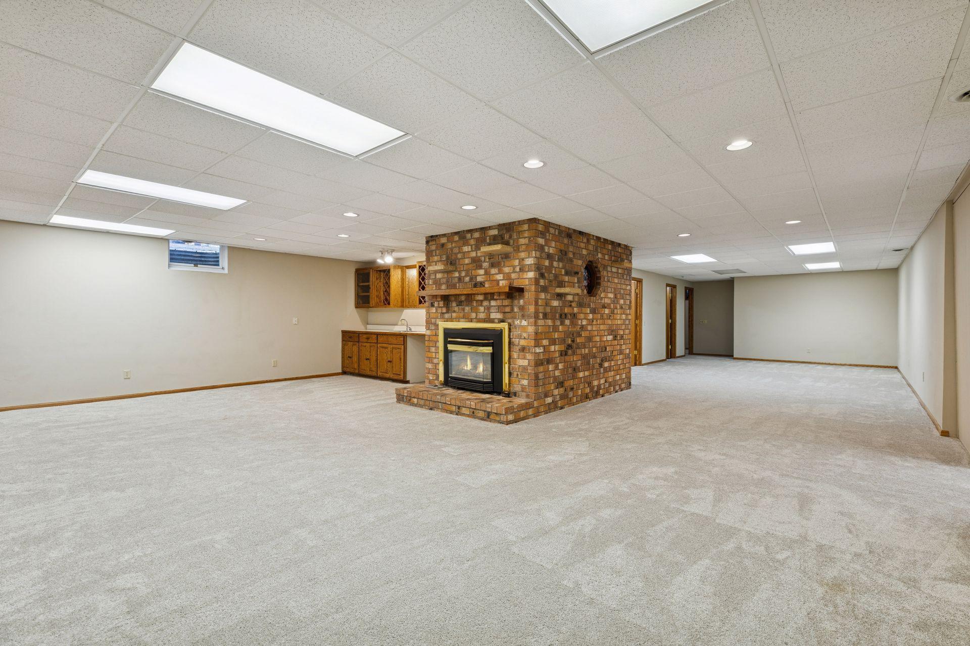 Expansive finished lower level family room and wet bar.