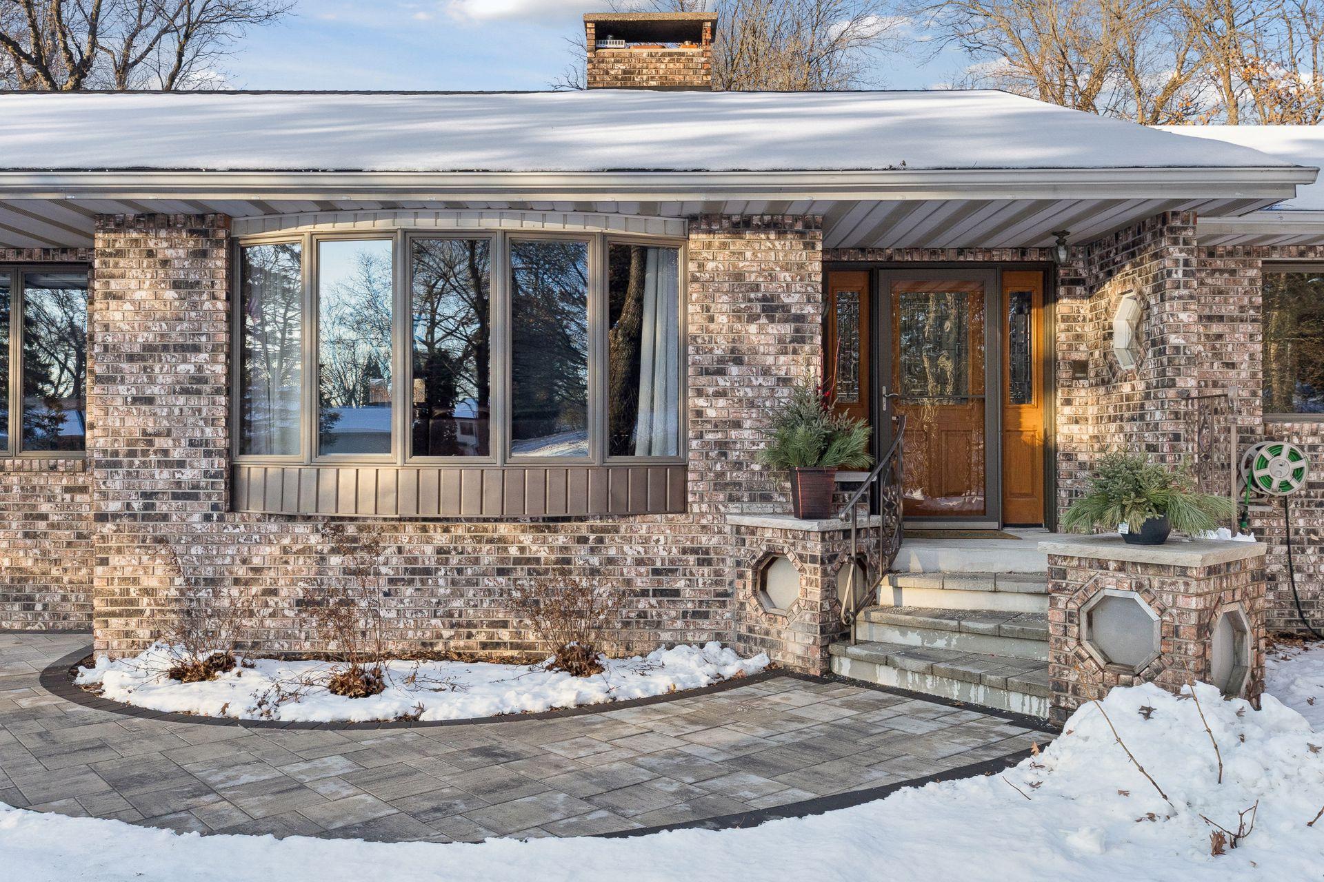 Redesigned front steps with slabs.