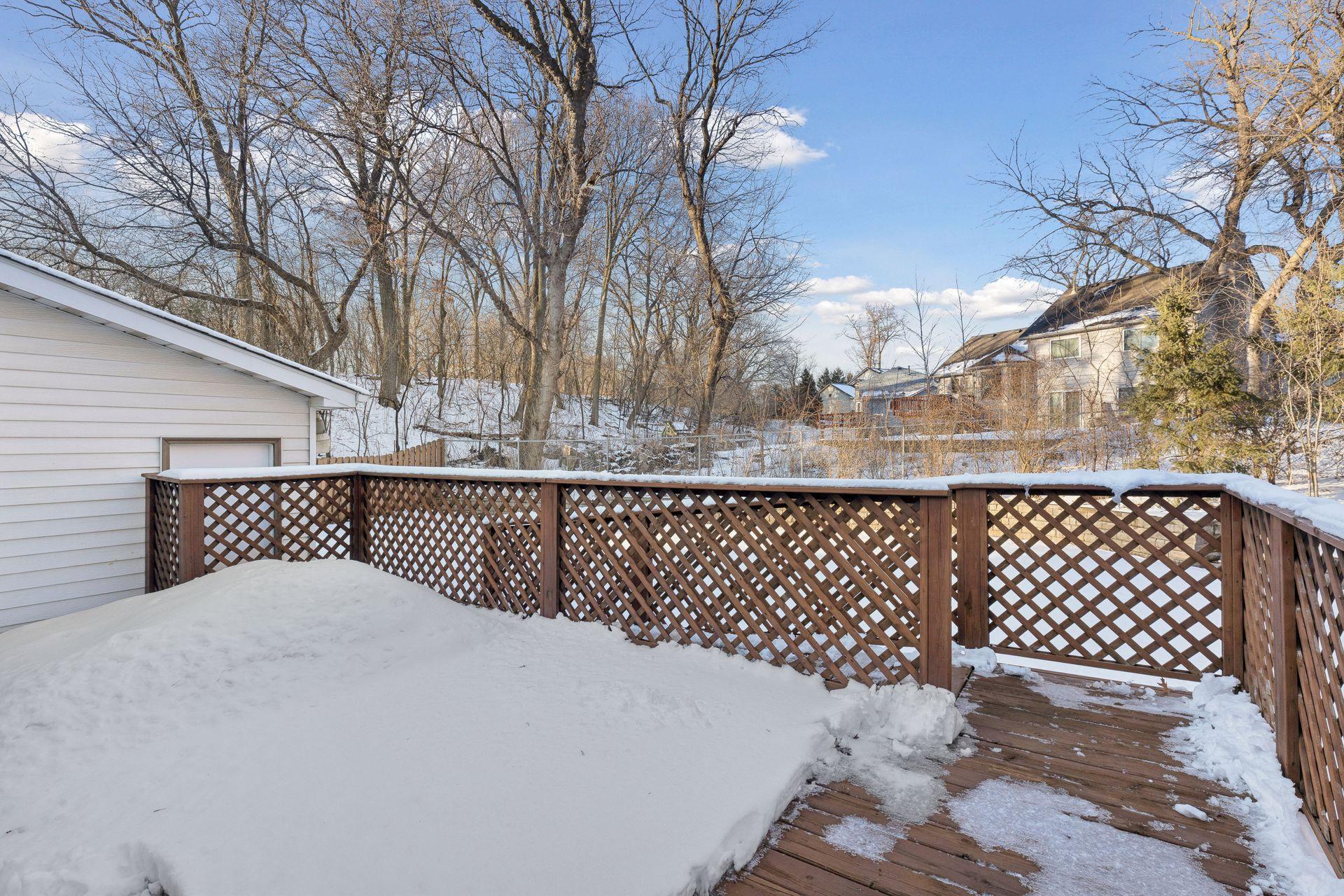 Rear deck with wheelchair ramp.