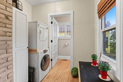 Main floor laundry off kitchen, main floor 1/2 bath