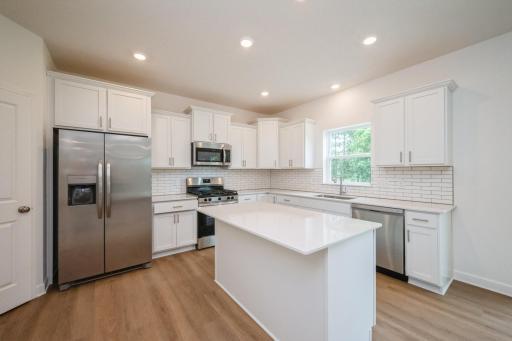 (Photo of a similar home, actual finishes may vary)