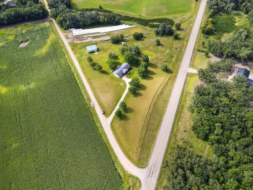 Farm land owned by others behind pole building