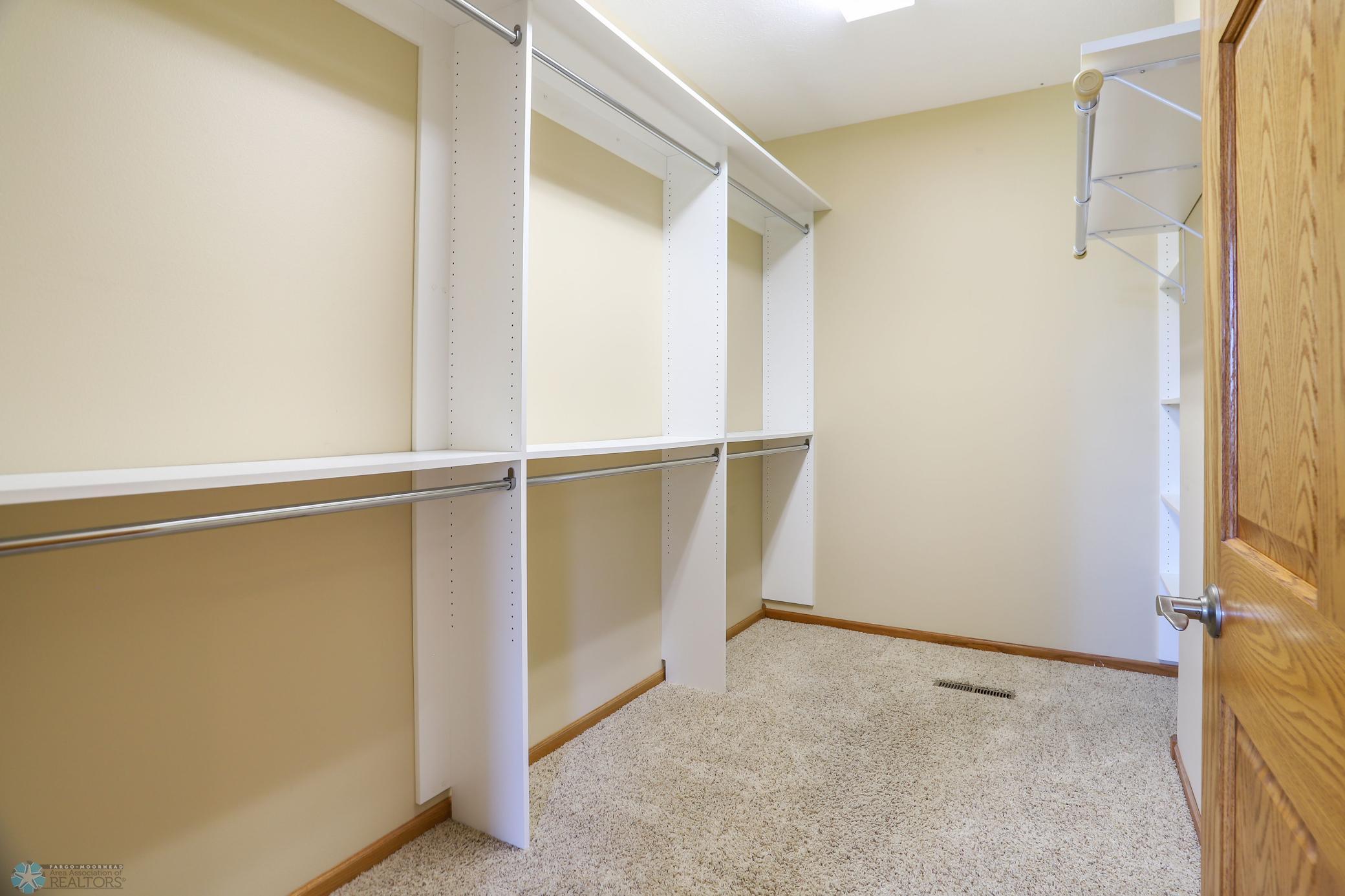 primary bedroom walk-in closet