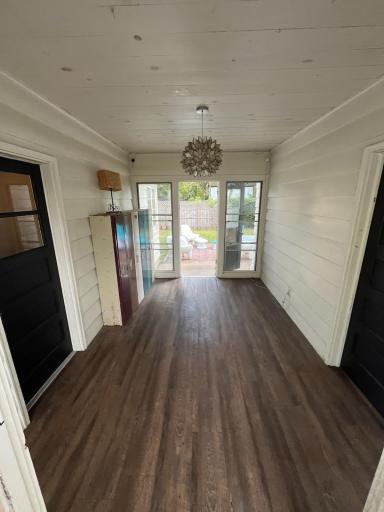 Breezeway from front to back of the house goes to fenced in yard!