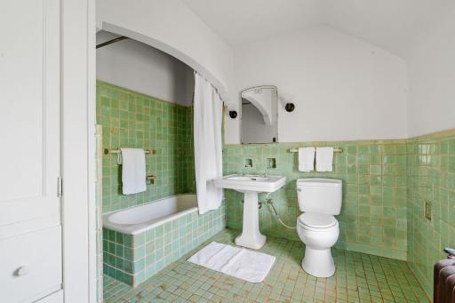 Upper level bathroom with arts and crafts original glazed tile!