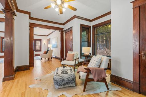 Side parlor can perform as a library or office.