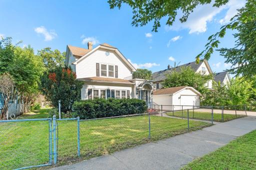 This unique property has a double lot, huge garages, a workshop, and large square footage.
