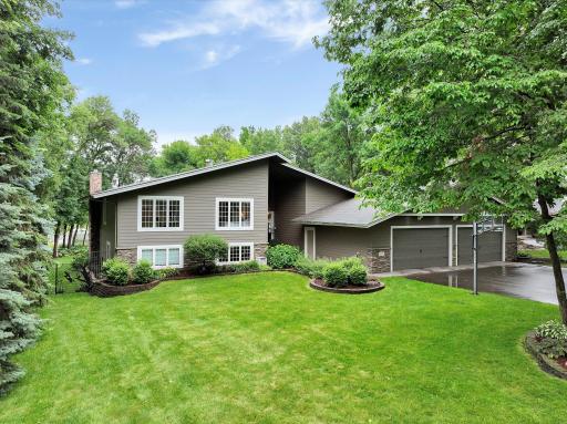 Hardie Board siding with cultured stone accents, roof replaced in 2024, windows replaced in 2018, driveway replaced in 2022 & an 8-Car Garage!!