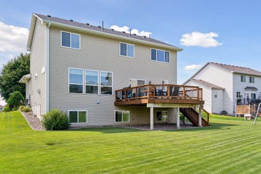 View of back. Note the nice landscape surrounding this fine home.