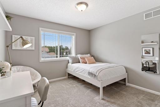 Upper level bedroom. Move in condition and decor.