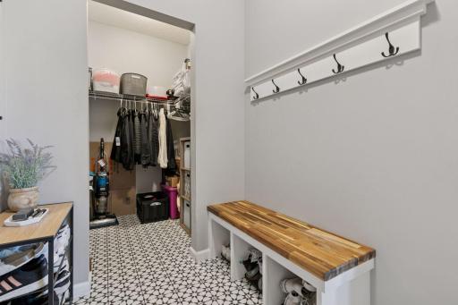 Built-in boot bench and coat hooks make for easy storage as you come and go.