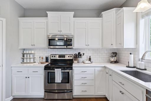 Appointed with authentic hardwood flooring and updated hardware.