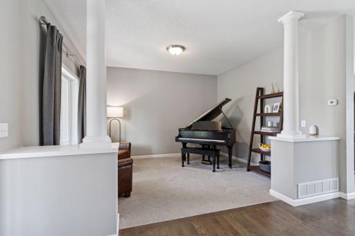 Spacious living/flex room, perfect for home office, formal dining or to show off your grand piano!