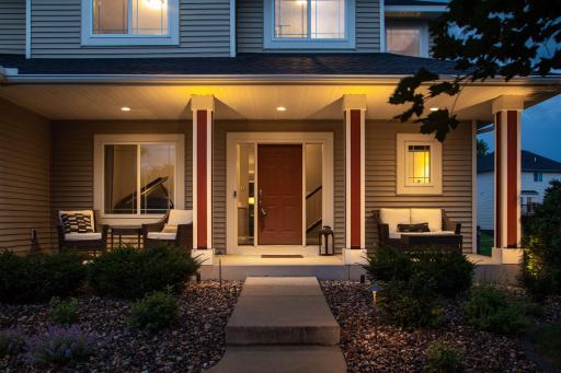 WELCOME HOME! Beautiful and timeless, this 2 story home boasts great curb appeal with the lovely covered front porch, accented by recessed lighting and front door flanked by 2 side-lites.