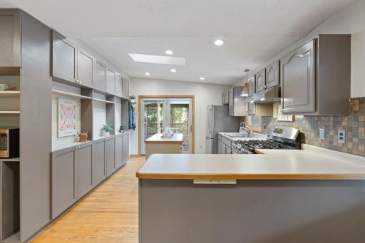 Kitchen features French door entry to outdoor entertaining