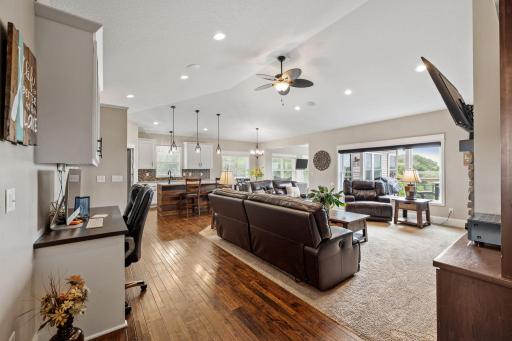 Open concept living, kitchen, and dining areas