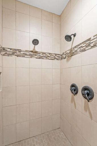 Large walk in shower with double shower heads