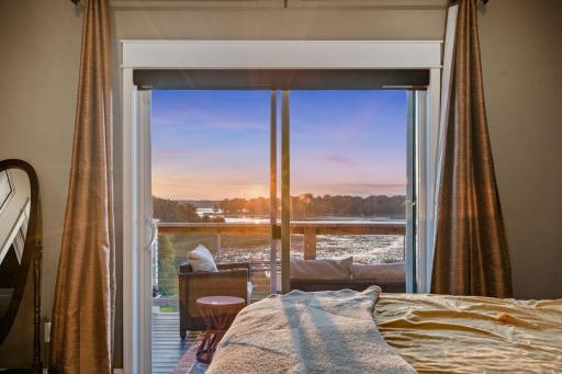 Primary suite features sunset views, too!