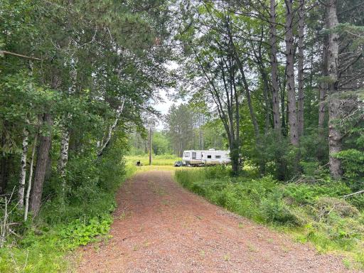 Secluded 21 acres in a prime Carlton County location - great for hunting or your up north getaway property! Looking down the driveway towards the lot from Middle Rd.