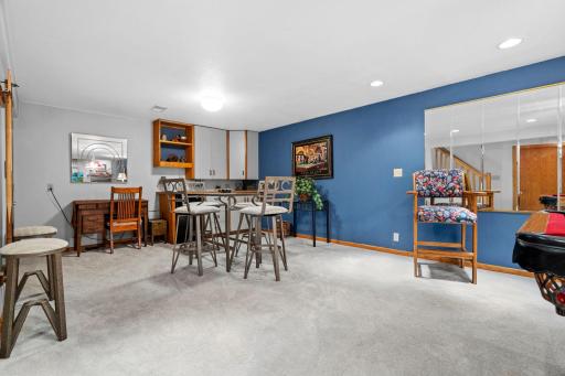 Cabinets, counter and refrigerator - great for entertaining!