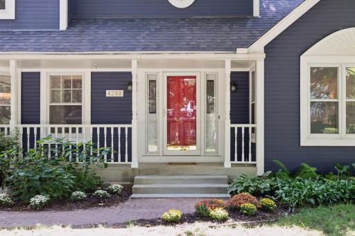 Welcoming Entry with a Traditional Front Porch